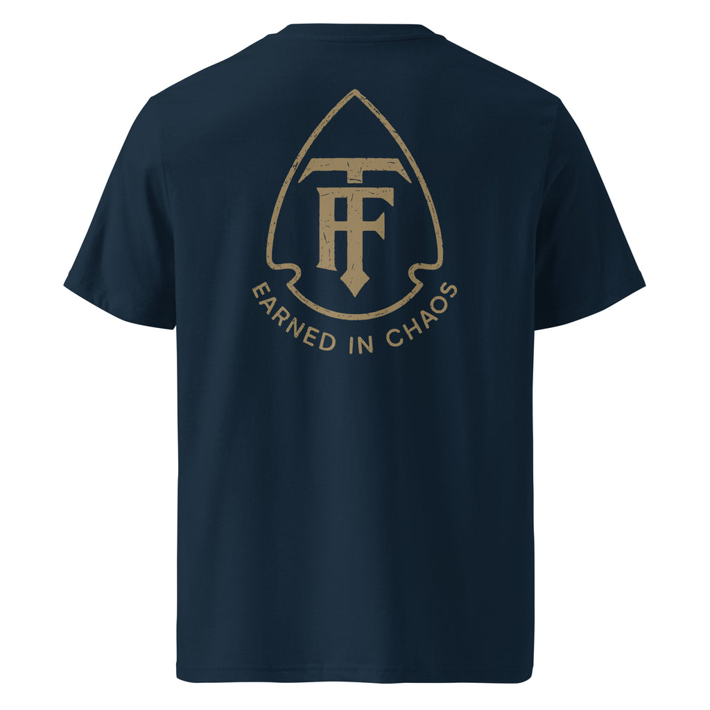 Back view of men's standard issue navy tee true few with earned in chaos logo design