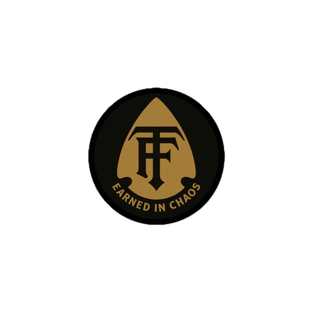 True Few OG sticker featuring a gold and black design with 'Earned in Chaos' text
